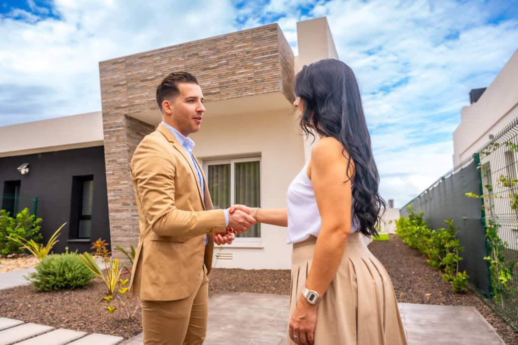 woman shaking hands to a real estate agent 2024 12 10 00 55 46 utc 2